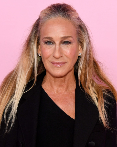 Sarah Jessica Parker posing in a black dress